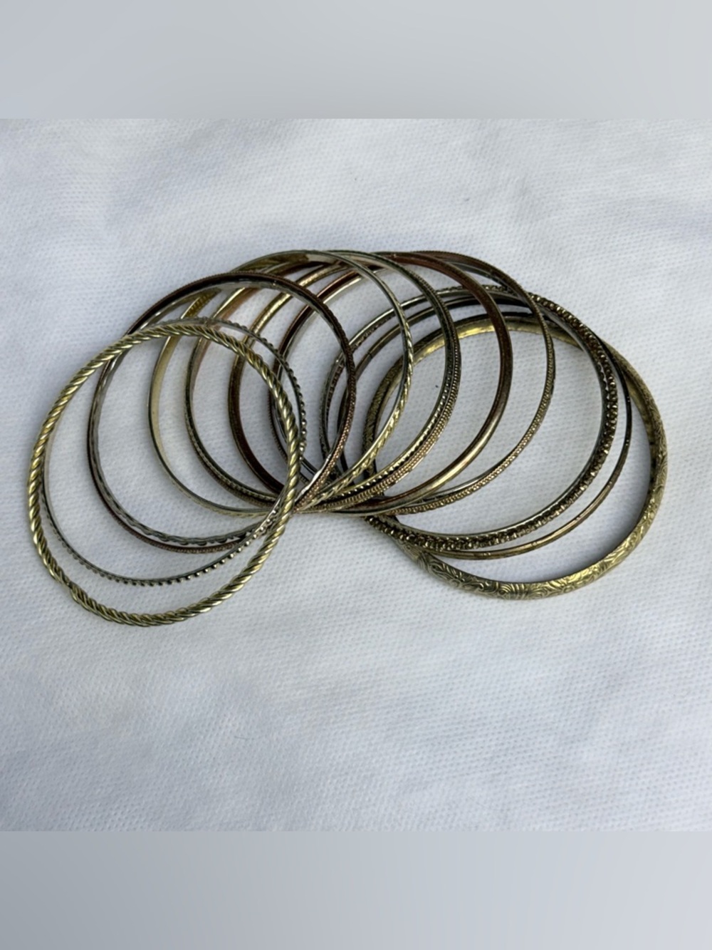 Lot of 14 gold tone bangle bracelets